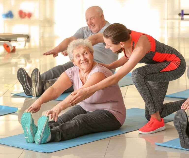 Stronger for longer - an older gym member receives instruction
